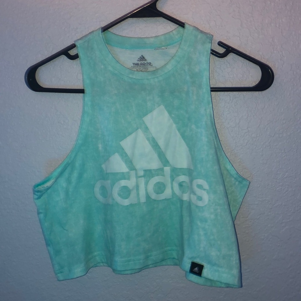 A teal adidas tank
